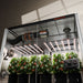 Spider Farmer 5x10 Grow Tent Kit – Dual G8600 800W LEDs, Smart Climate System Indoor farming setup with plants, lights, and control panel in a controlled environment.