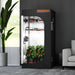 Spider Farmer® 3’x3’x6′ Grow Tent Spider Farmer indoor gardening system in a room with a plant and sofa.