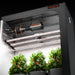 Spider Farmer SE4500 320W LED Grow Light – Smart High-Efficiency Lighting for 2×4 and 3×5 Grow Spaces Spider Farmer indoor gardening system with plants growing inside