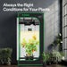  Vivosun 2x2 Smart Grow Tent Kit – 100W LumaLight & GrowHub E42A+ VIVOSUN indoor gardening system with plants inside, against a dark wall.
