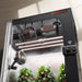 Spider Farmer indoor gardening system with plants underneath