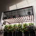 Spider Farmer 5'x10'x6.5' Grow Tent Kit – 2x G1000W Gardening system with plants, lights, and control panel inside a greenhouse.
