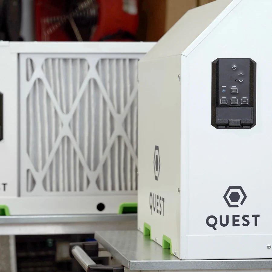 Quest 225 208/230V Dehumidifier White machine with 'Quest' branding on a blurred background